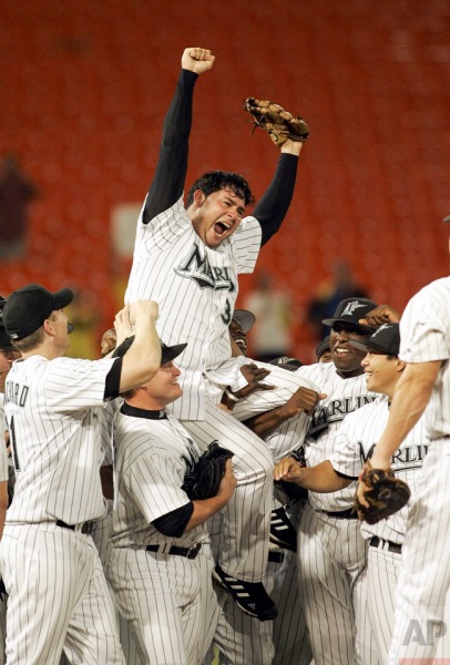 Florida Marlins pitcher Anibal Sanchez of Venezuela is hoisted atop his teammates' shoulders as they celebrate his 2-0 no-hit win over the Arizona Diamondbacks, Wednesday, Sept. 6, 2006, at Dolphin Stadium in Miami. (AP Photo/Wilfredo Lee)