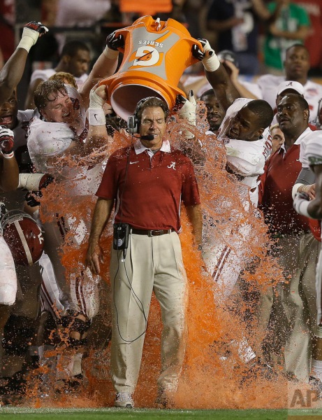 Alabama head coach Nick Saban is dunked with Gatorade in the final seconds of the BCS National Championship college football game against Notre Dame, Monday, Jan. 7, 2013, in Miami. Alabama won 42-14. (AP Photo/Wilfredo Lee)
