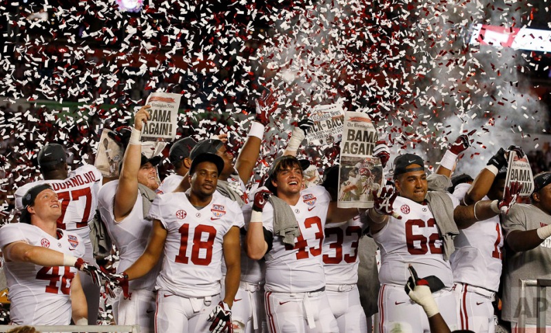 Alabama players celebrate after the BCS National Championship college football game against Notre Dame, Monday, Jan. 7, 2013, in Miami. Alabama won 42-14. (AP Photo/Wilfredo Lee)