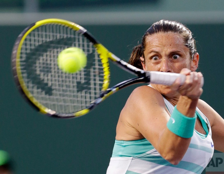 Roberta Vinci of Italy, returns a shot from Jelena Jankovic of Serbia, during the Sony Open tennis tournament, Wednesday, March 27, 2013 in Key Biscayne, Fla. (AP Photo/Wilfredo Lee)