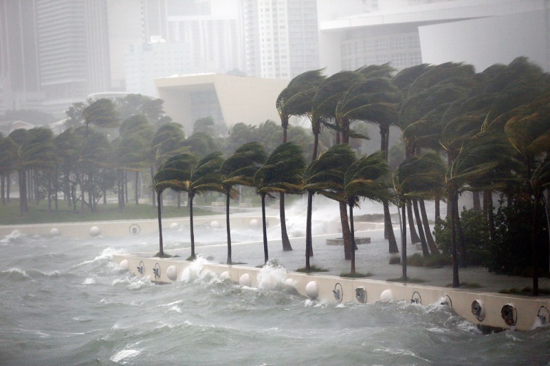 Waves crash over a seawall from Biscayne Bay as Hurricane Irma passes by, Sunday, Sept. 10, 2017, in Miami. (AP Photo/Wilfredo Lee)