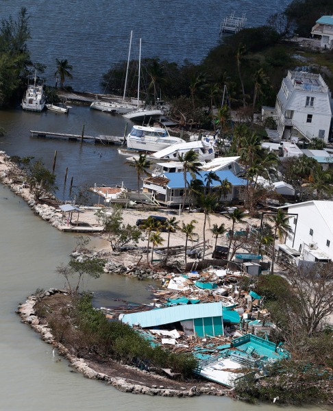 In this Sept. 11, 2017 photo, debris lies from a destroyed building in the aftermath of Hurricane Irma in Key Largo, Fla. It’s not just this year. The monster hurricanes Harvey, Irma, Maria, Jose and now Lee that have raged across the Atlantic are contributing to what appears to be the most active period for major storms on record.   (AP Photo/Wilfredo Lee)